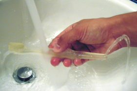 Illustration for article titled Brush & Rinse Toothbrush Creates Mini Water Fountain